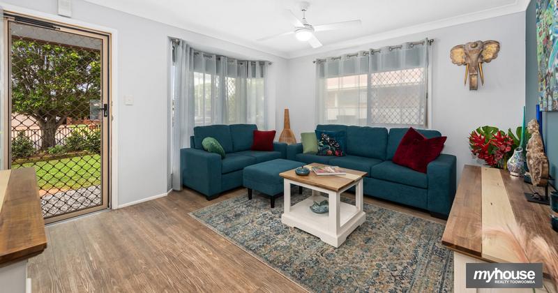 Main living area with reverse-cycle air-conditioning and automated blinds