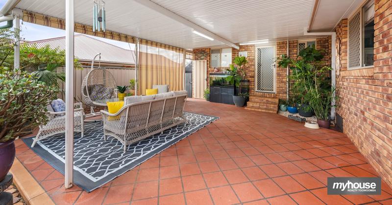 South-facing outdoor entertaining area with western-facing roller blinds